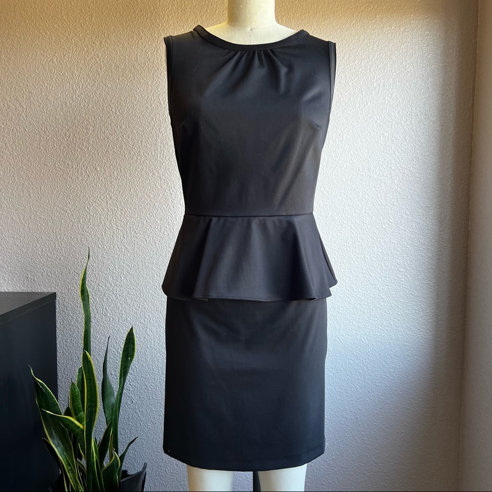 Black Peplum dress with exposed back zipper